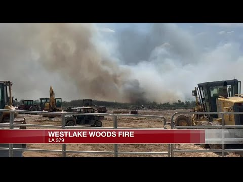 Woods fire ignites near Houston River Road